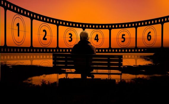 Man sitting on bench at sunset, with film countdown from 1 to 6 in the background.