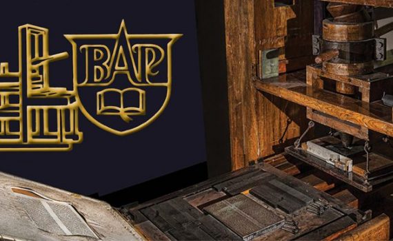 Vintage printing press with ornate logo, featuring BAP and book, symbolizing traditional book publishing.