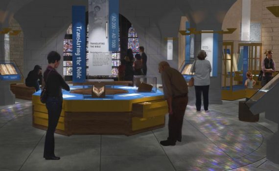 Visitors explore a Bible translation exhibit in a museum with interactive displays and historical artifacts.