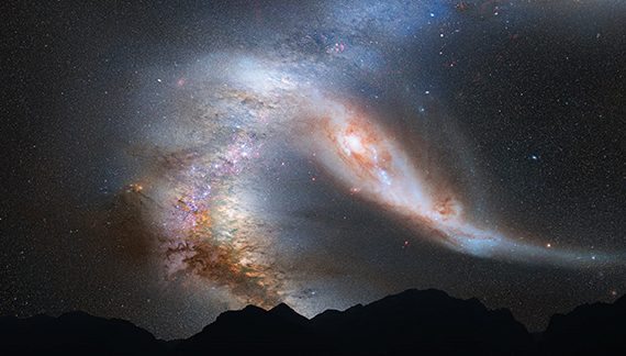 Collision of two galaxies in a starry night sky above silhouetted mountains.