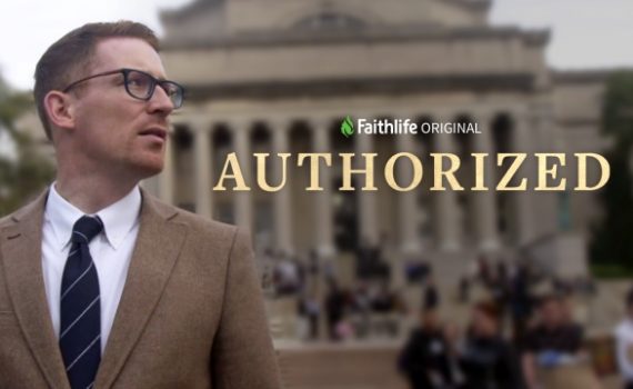 Man in suit with glasses stands outdoors, Faithlife Original: Authorized text over a blurred crowd and building background.