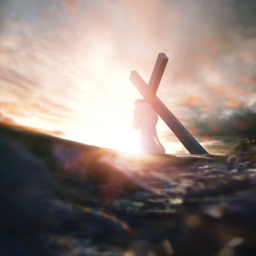 Person carrying cross at sunrise on hill, symbolizing faith and perseverance.